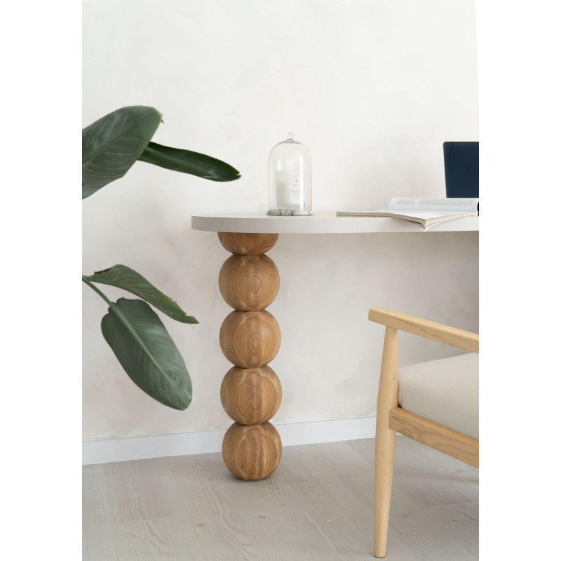 An elegant Japandi-style desk featuring a carved leg