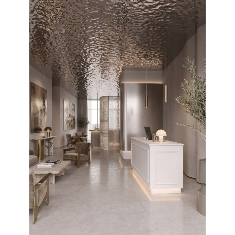 An elegant white store counter with stucco trim