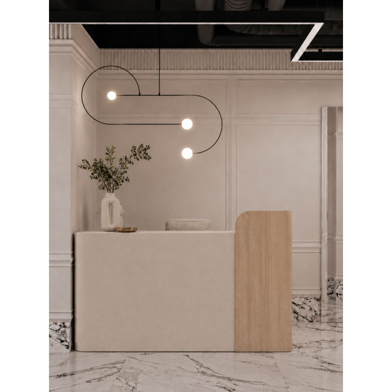 A light-colored store counter with wooden decorations